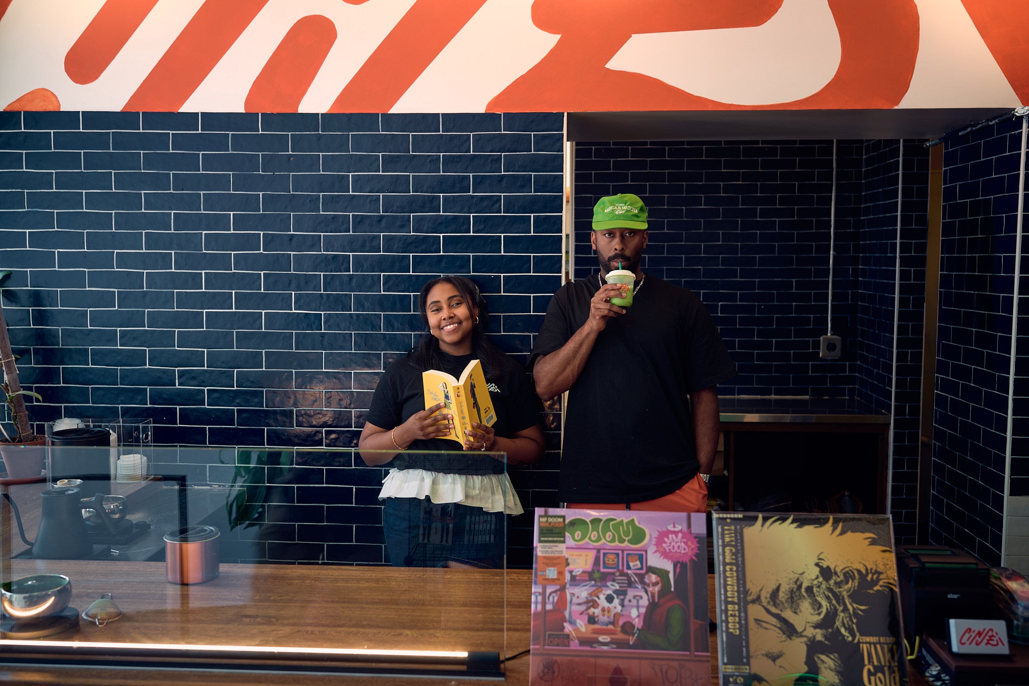Photo — matcha counter & manga wall, Cincinnati